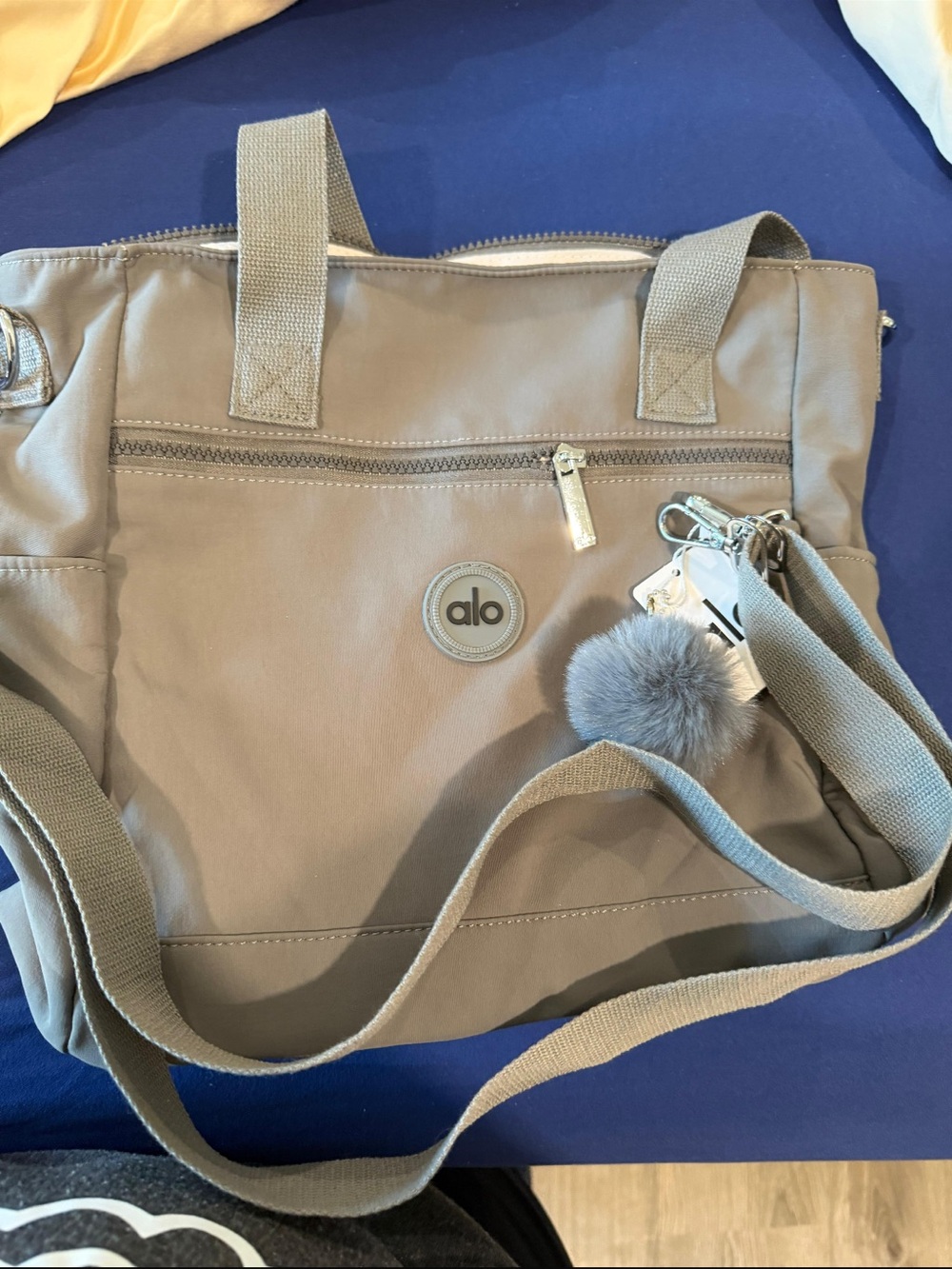 ALO Yoga Taupe Shoulder Bag with Pom Key Charm
